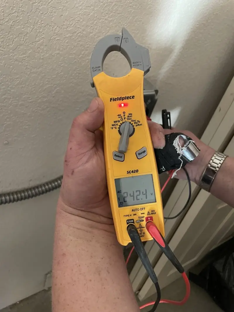 Voltage testing with clamp meter during Generator Installation in Penbrook